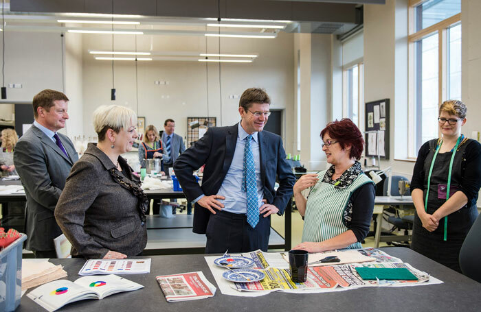 Royal Opera House chief executive Alex Beard, Thurrock MP Jackie Doyle-Price and local government minister Greg Clark meet staff at the new facility