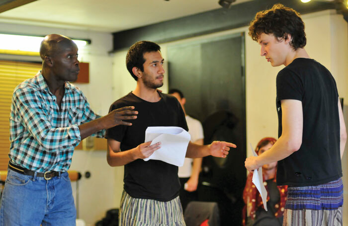 Two RADA students taking direction during a workshop