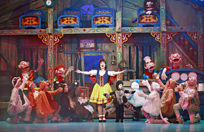 Amie Howes with the ensemble in Snow White at the Theatre Royal, Norwich
