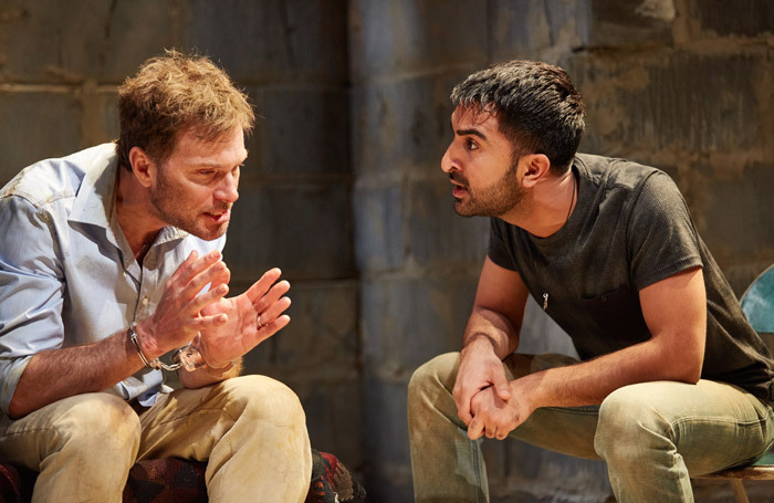 Daniel Lapaine and Parth Thakerar in The Invisible Hand at Tricycle Theatre, London. Photo: Mark Douet