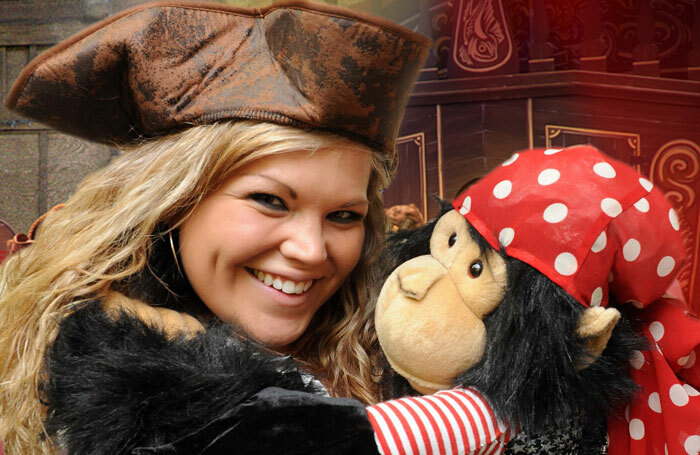 Rachel Born and Bananas the monkey in Treasure Island at the Gilded Balloon, Edinburgh