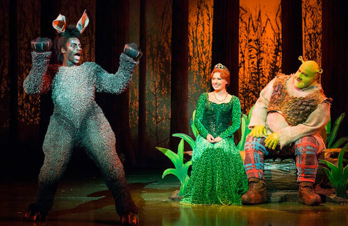 Sylvia Young graduate Idriss Kargbo with Bronte Barbe and Dean Chisnall in the UK tour of Shrek Photo: Helen Maybanks
