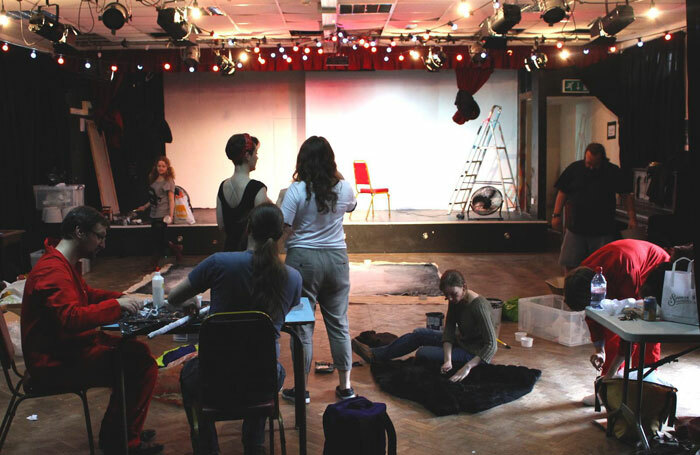 Volunteers renovating Bristol Improv Theatre's new venue