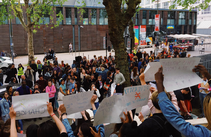 Students and staff gathered outside Central on May 11 in support of systematic change within the institution