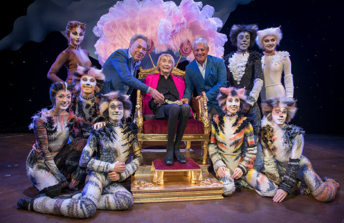 Gillian Lynne, seated, Andrew Lloyd Webber and Cameron Mackintosh with cast members of Cats at the renaming of the New London Theatre in Lynne's honour. Photo: Craig Sugden