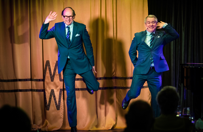 Eric and Ern perform their act, a tribute to Morecambe and Wise, in the Limelight Club on board P&O Cruises' Britannia. Photo: Christopher Ison