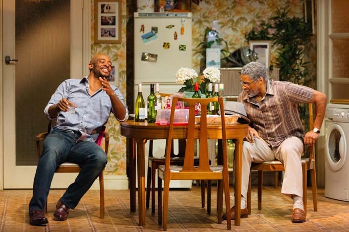 Oliver Alvin-Wilson as Robert and Ricky Fearon as Uncle Vince in Nine Night at the National Theatre. Photo: Helen Murray