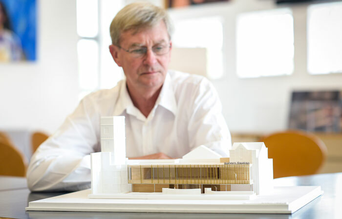 Malvern Theatres' chief executive Nic Lloyd with the architect's model of the proposed new workshop space. Photo: James Watkins