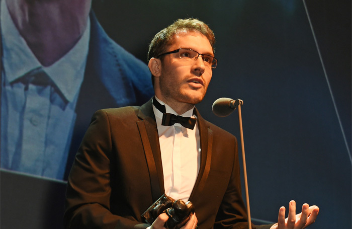 Robert Icke accepting the Evening Standard award for best director in 2015. Photo: Dave Benett