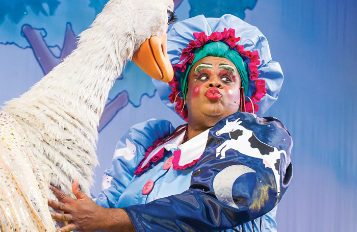 Clive Rowe in Mother Goose: The dames' increasingly outrageous costumes are fundamental to a successful pantomime. Photo: Tristram Kenton