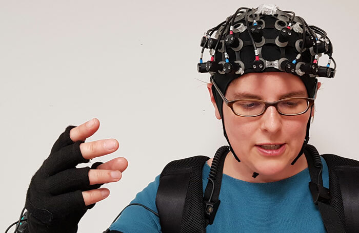 Antonia Hamilton wearing the brain-imaging equipment