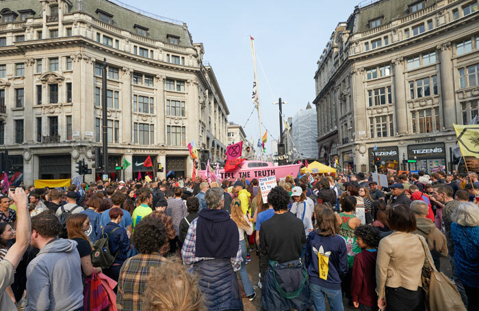 Supporters of climate change group Extinction Rebellion surround a boat blocking London's Oxford Circus as part of a series of protests across the capital. Photo: Shutterstock