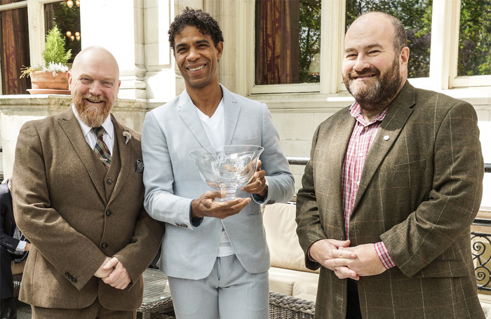 Critics' Circle dance section chair Graham Watts with award-winner Carlos Acosta and Critics’ Circle president Mark Shenton Photo: Peter Hogan