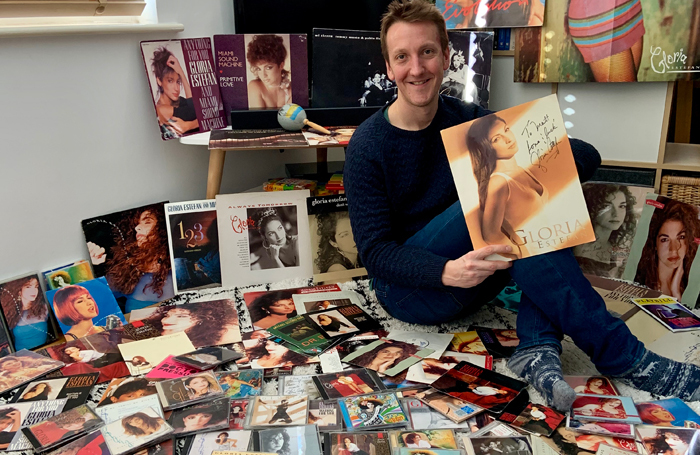 Matt Hemley with his collection of Gloria Estefan albums and memorabilia