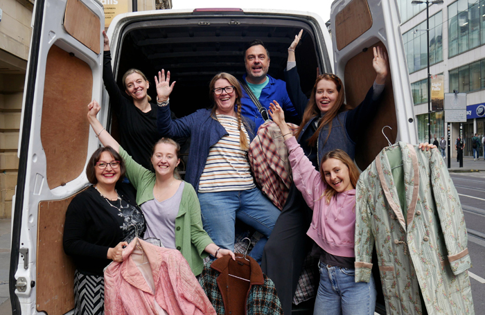 Staff from Manchester Royal Exchange celebrate the return of the missing van