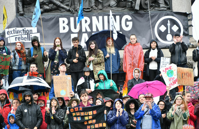 Members of environmental campaign group Extinction Rebellion protest in  Trafalgar Square in October 2019. Photo: Shutterstock