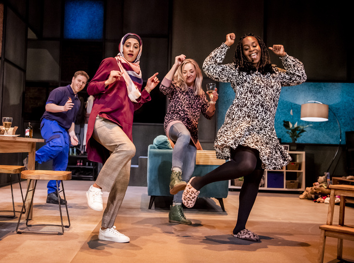 Thomas Coombes, Manjinder Virk, Claire-Louise Cordwell and Petra Letang in A Kind Of People at the Royal Court, London. Photo: Tristram Kenton