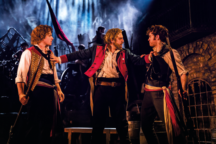 Ashley Gilmour, Jon Robyns and Harry Apps in Les Misérables. Photo: Johan Persson