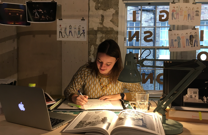 Grace Smart at work. Designers are getting booked later and later, she says, with resulting brain ache due to the pressures of time. Photo: Frankie Bradshaw