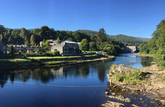 The view of Pitlochry Festival Theatre from across the River Tummel