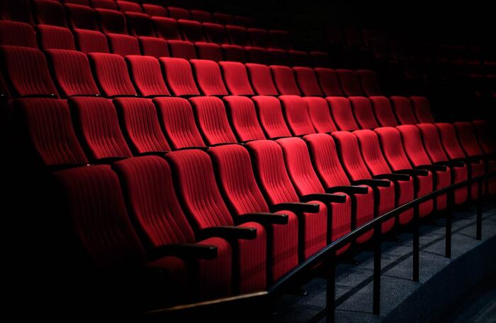 Theatre seats audience empty chairs auditorium. Photo: Getty Images