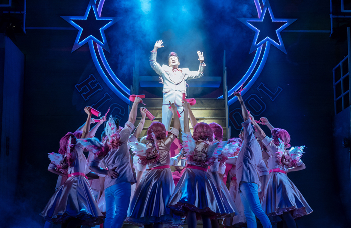 Peter Andre as Teen Angel and the cast of the 2019 UK and Ireland tour of Grease. Photo: Manuel Harlan