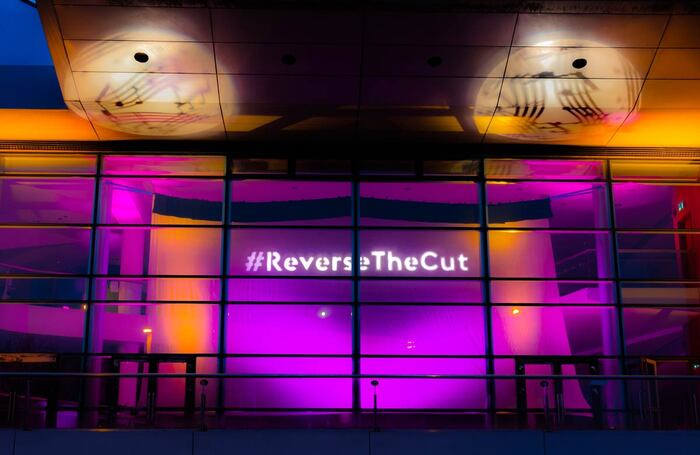 Anvil Arts lit up two of its venues on April 21 to raise awareness of the impact of the 50% cut. Photo: Jamie Bond