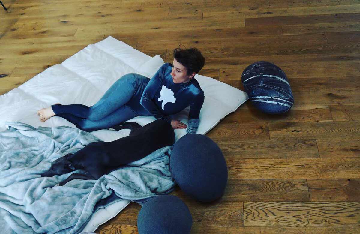 Lucy Suggate in A Giant Dog Bed/Reclining Duet. Photo: Amy Sinaed