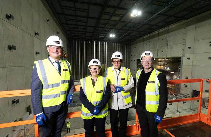 John McGrath (far right), at the building site for Factory International, Manchester, due to open in June 2023. Photo: James Speakman/PA Wire