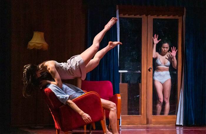 Eliana Stragapede, Alejandro Moya and Wan-Lun Yu in The Lost Room section of Triptych by Peeping Tom at Barbican Theatre, London, part of London International Mime Festival. Photo: Tristram Kenton