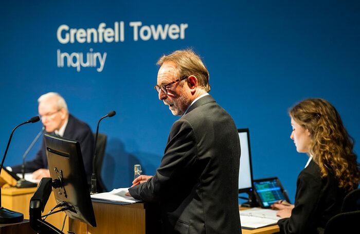 Ron Cook (centre) in Grenfell: System Failure – Scenes from the Inquiry at the Playground Theatre, London. Photo: Tristram Kenton