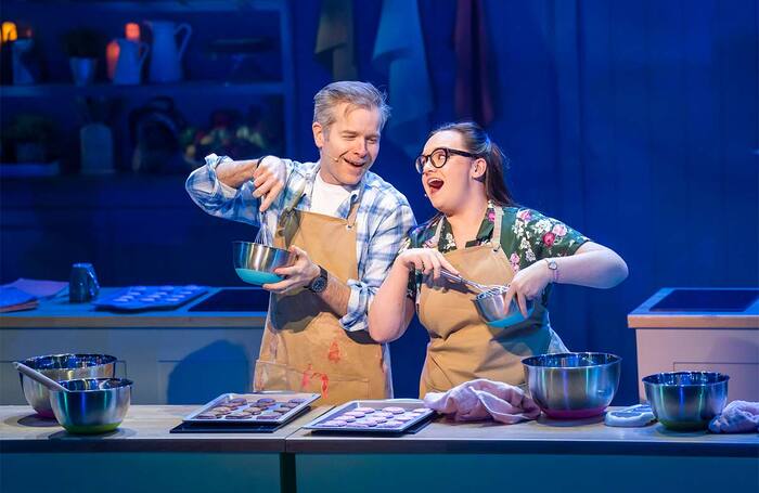 Damian Humbley and Charlotte Wakefield in The Great British Bake Off Musical at the Noël Coward Theatre, London. Photo: Tristram Kenton