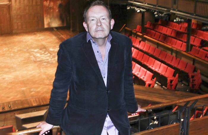 Michael Boyd in front of the Royal Shakespeare Theatre stage in 2011. Photo: Ellie Kurttz