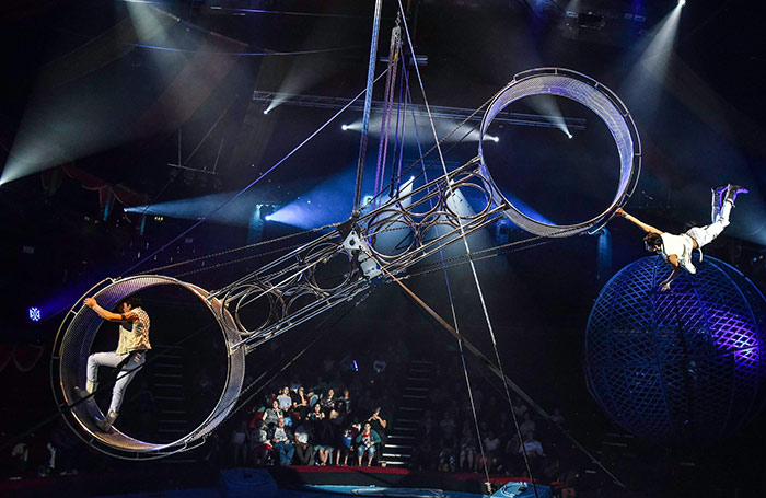 Performers on a 'wheel of death' at a past show